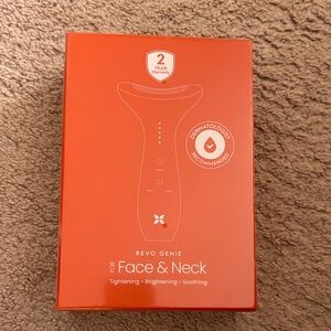 REVO GENIE Face & Neck Tightening Device NIB 2 Year Warranty